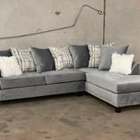 L-Shaped Sectional covered in Grey Velvet with Silver nail heads