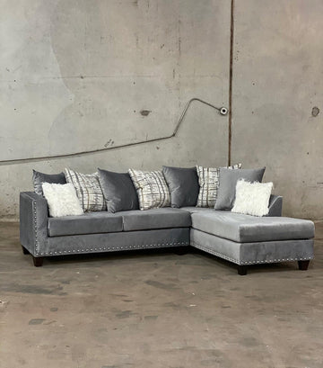 L-Shaped Sectional covered in Grey Velvet with Silver nail heads